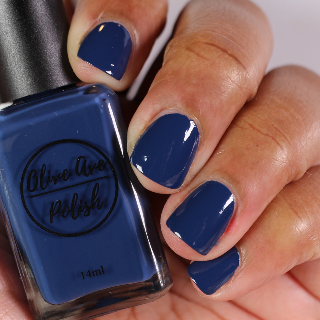 navy blue nail polish on dark skin tone