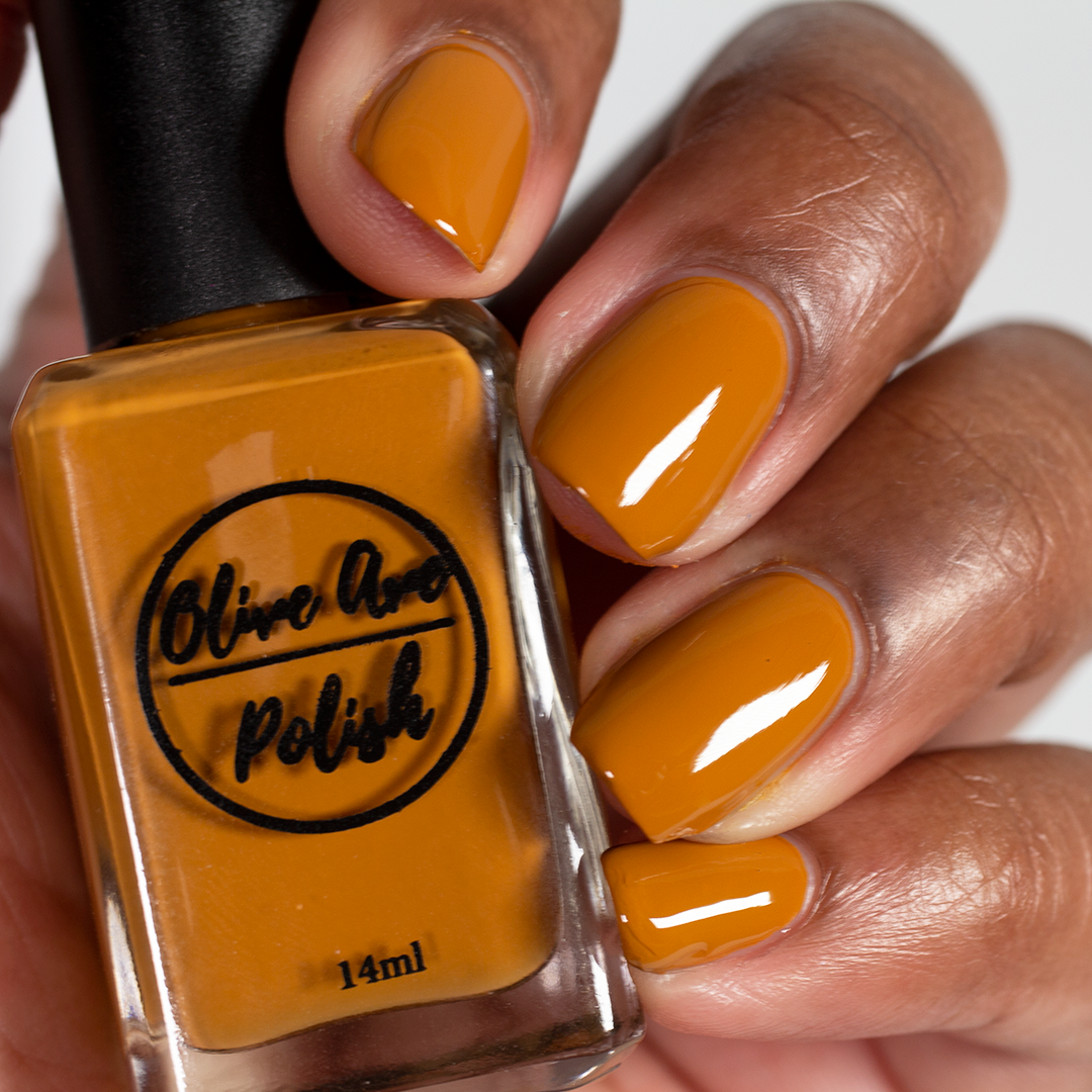caramel nail polish swatch on medium skin tone