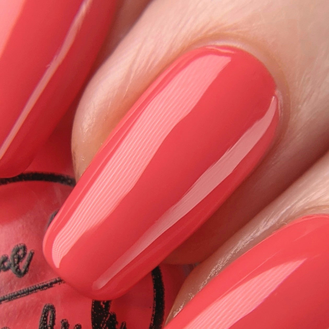 summer red nail polish swatch on pale skin tone