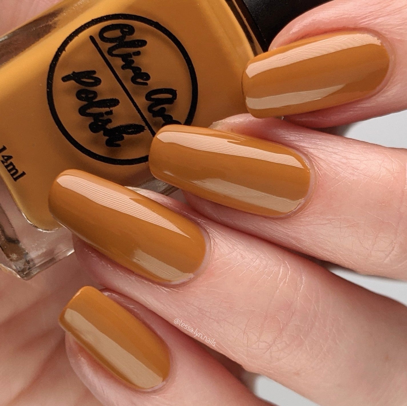 caramel nail polish swatch on pale skin tone