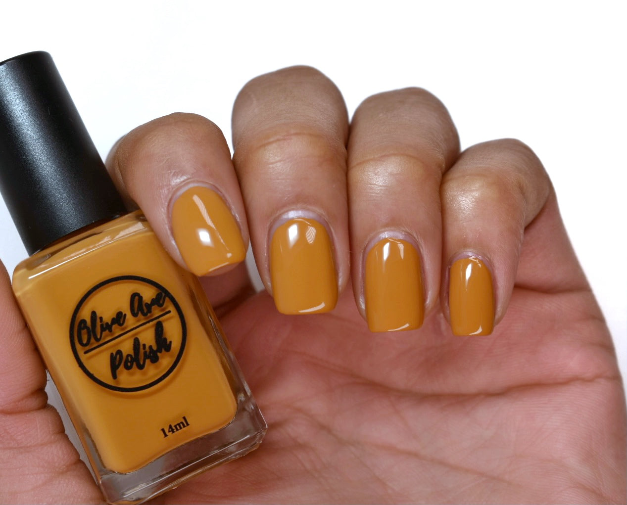 caramel nail polish swatch on medium skin tone