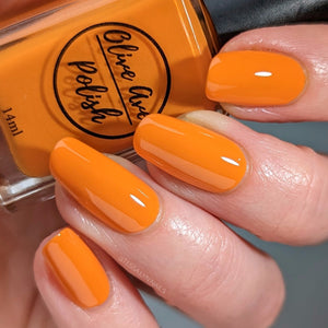 Fall orange nail polish swatch on pale skin tone