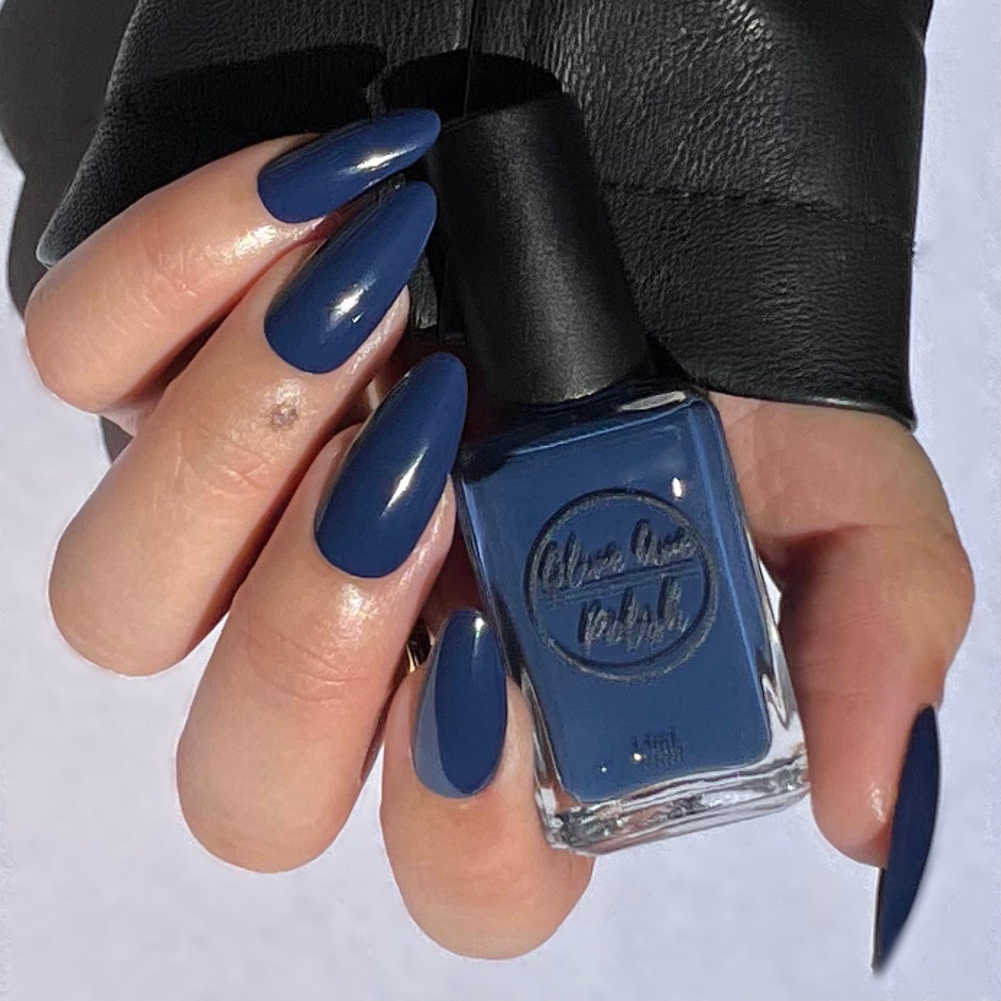 navy blue nail polish on asian skin tone