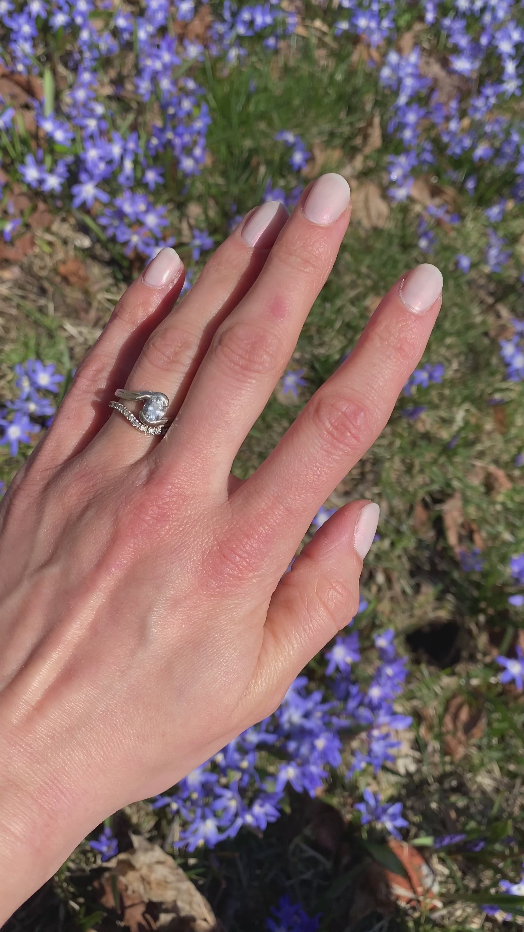 Light pink nail polish with shimmer full hand video