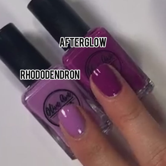 comparison of a light purple cream and a dark purple cream on the nails