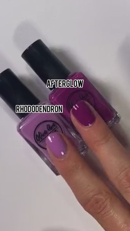 comparison of a light purple cream and a dark purple cream on the nails