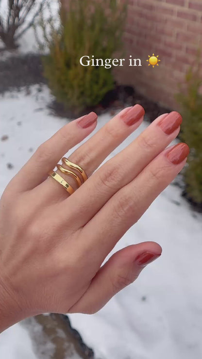 Brown orange holographic nail polish outside and inside