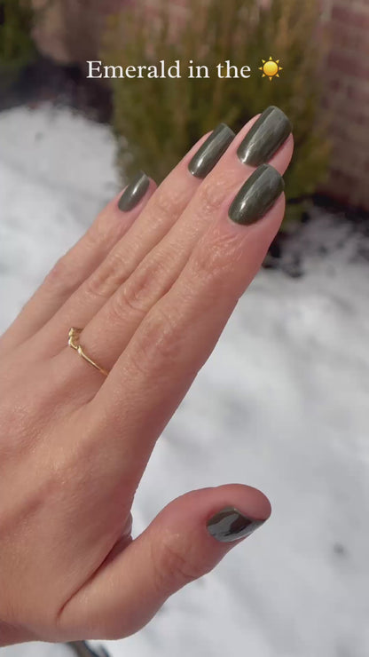 Green holographic nail polish outside and inside