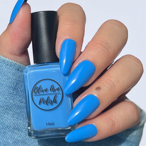 Bright Sky Blue nail polish swatch on pale skin tone