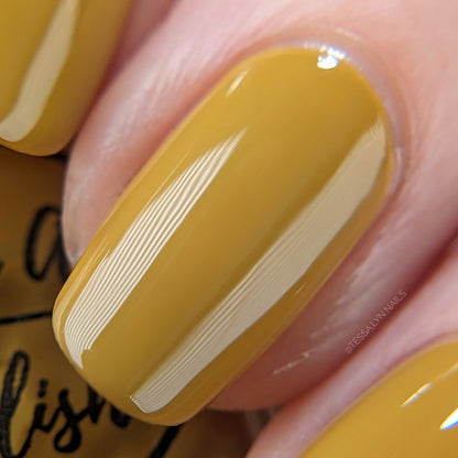 mustard yellow nail polish macro