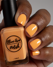 Load image into Gallery viewer, Creamsicle Orange nail polish swatch on medium dark skin tone