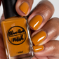 caramel nail polish swatch on medium skin tone
