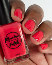 Load image into Gallery viewer, summer red nail polish swatch on medium skin tone