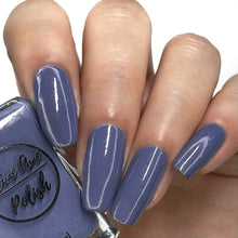 Load image into Gallery viewer, Purple shimmer nail polish swatch on pale skin tone