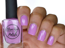 Load image into Gallery viewer, light purple nail polish swatch on medium skin tone