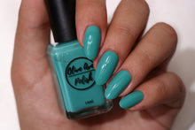 Load image into Gallery viewer, Blue Green nail polish swatch on pale skin tone