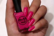 Load image into Gallery viewer, bright pink nail polish swatch on medium skin tone