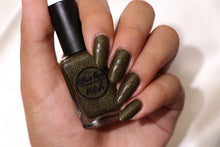 Load image into Gallery viewer, Green holographic nail polish swatch on pale skin tone