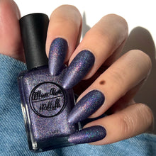Load image into Gallery viewer, Purple holographic nail polish swatch on pale skin tone