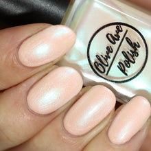 Load image into Gallery viewer, White pearl nail polish swatch on pale skin tone