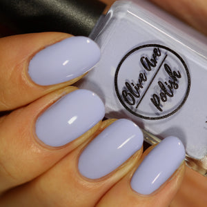 Pastel purple nail polish swatch on pale skin tone