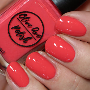 summer red nail polish swatch on pale skin tone