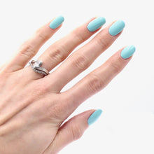 Load image into Gallery viewer, tiffany blue nail polish on pale skin tone