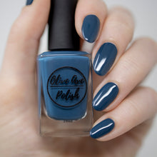 Load image into Gallery viewer, Peacock blue nail polish swatch on pale skin tone