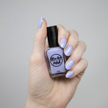 Load image into Gallery viewer, Pastel purple nail polish swatch on pale skin tone