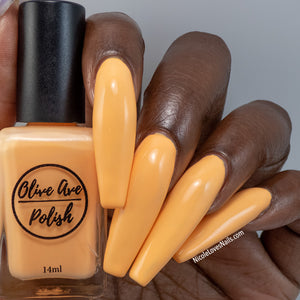 Creamsicle Orange nail polish swatch on dark skin tone