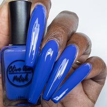 Load image into Gallery viewer, blue purple nail polish swatch on deep skin tone