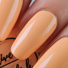 Load image into Gallery viewer, Creamsicle Orange nail polish swatch on pale skin tone