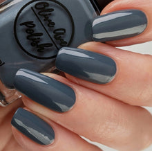 Load image into Gallery viewer, blue grey nail polish swatch on pale skin tone