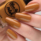 caramel nail polish swatch on pale skin tone