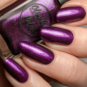 purple metallic nail polish swatch on pale skin tone