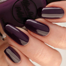 Load image into Gallery viewer, deep purple nail polish swatch on pale skin tone
