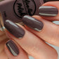 purple grey nail polish swatch on pale skin tone