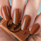 Fall orange nail polish swatch on pale skin tone
