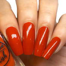 Load image into Gallery viewer, fall red nail polish swatch on pale skin tone