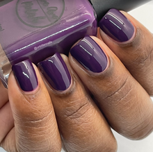 Load image into Gallery viewer, deep purple nail polish swatch on medium deep skin tone