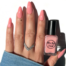 Load image into Gallery viewer, pastel coral nail polish swatch on pale skin tone