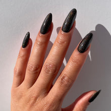 Load image into Gallery viewer, brown holographic nail polish swatch on pale skin tone