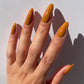 caramel nail polish swatch on pale skin tone