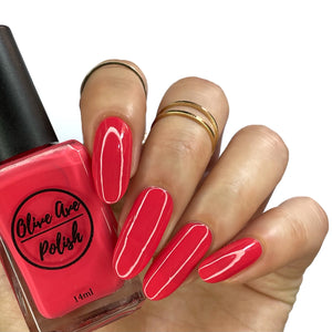 summer red nail polish swatch on pale skin tone