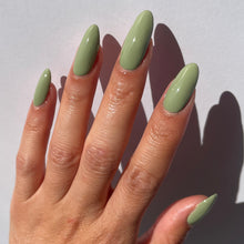 Load image into Gallery viewer, sage green nail polish swatch on pale skin tone