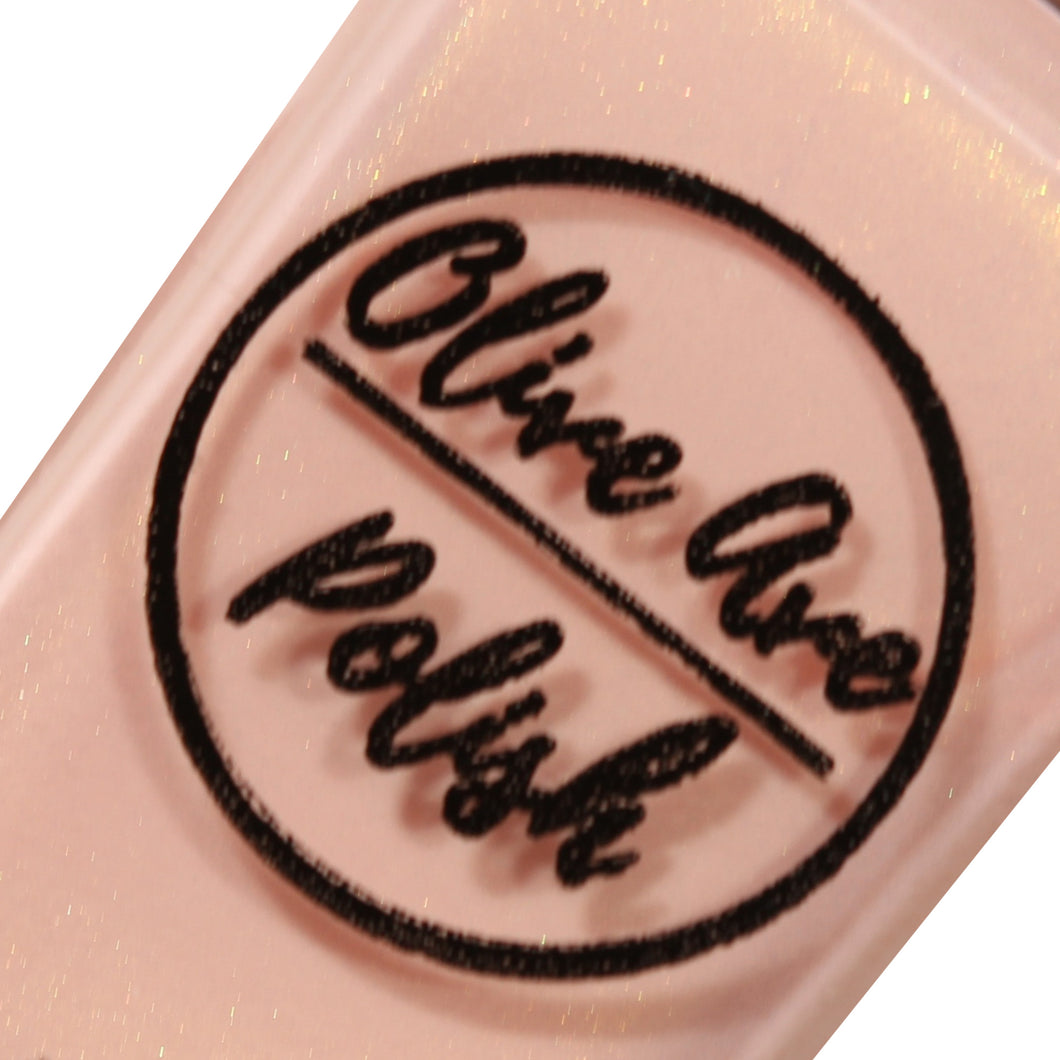 Pink nail polish with gold shimmer