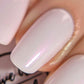 Light purple shimmer nail polish swatch on pale skin tone