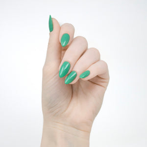 jade green nail polish swatch on pale skin tone