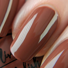 Load image into Gallery viewer, Fall brown nail polish swatch on pale skin tone