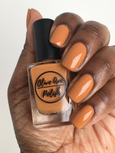 caramel nail polish swatch on medium dark skin tone
